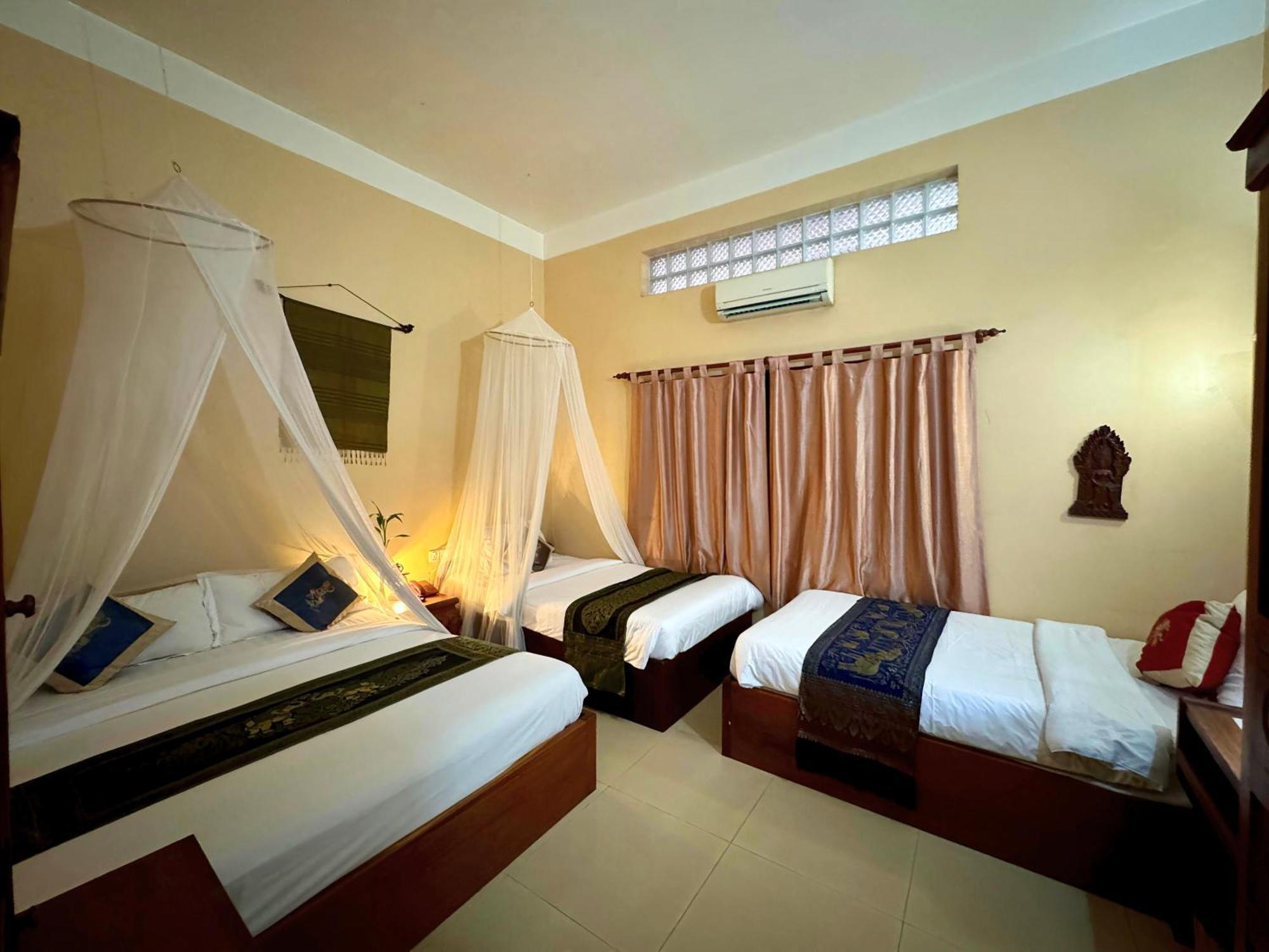Shining Angkor Boutique Hotel Sziemreap Szoba fotó